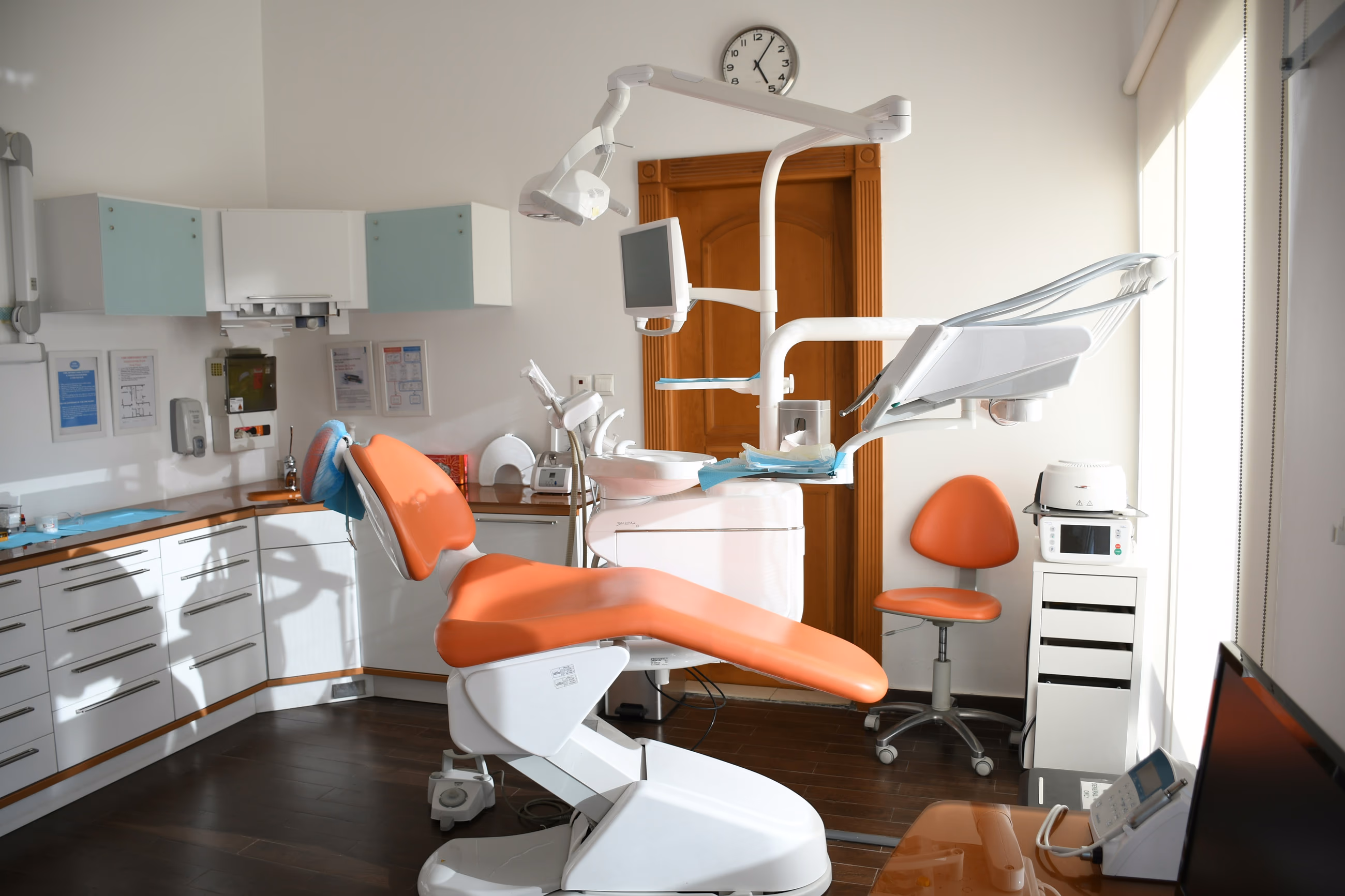 A dental operatory chair by the window